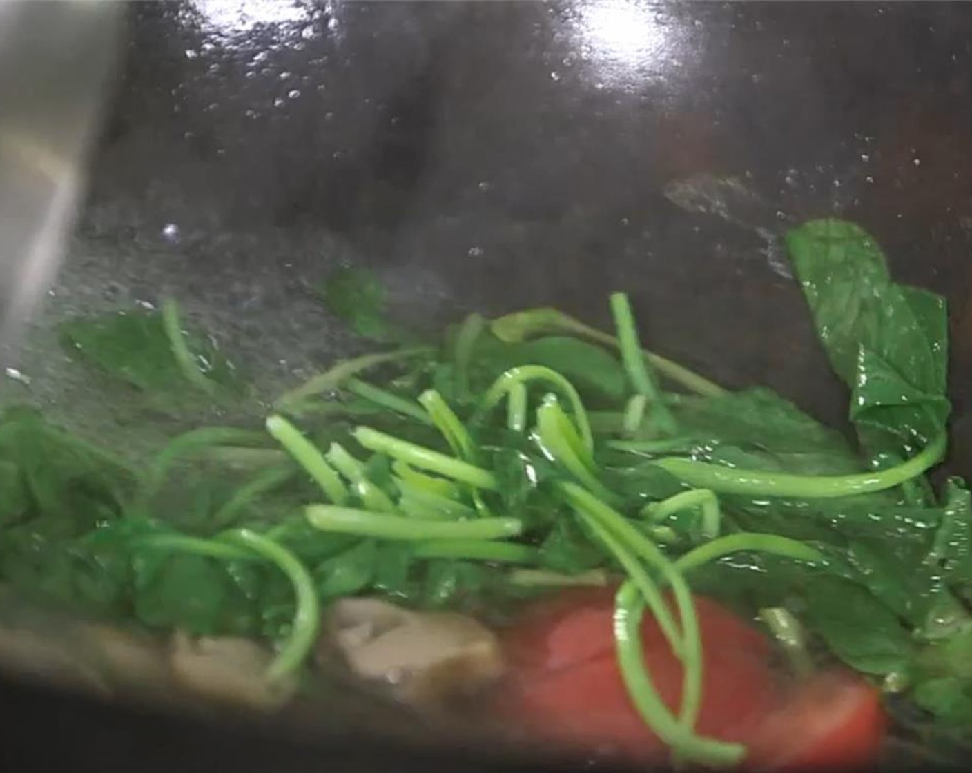 step 2 In a pan over medium-high heat, add some Canola Oil (as needed) and saute the diced tomatoes, mushrooms, and Fresh Spinach (3/4 cup) together until tender, about a minute or two.