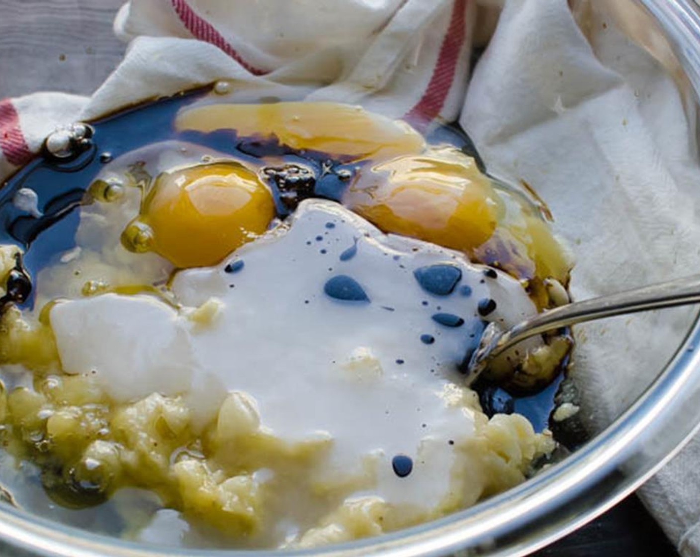 step 2 In a large bowl, mash the Bananas (3) with a fork. Add the Coconut Oil (1/4 cup), Farmhouse Eggs® Large Brown Eggs (3), Agave Syrup (2 Tbsp) and Vanilla Extract (1/2 Tbsp), and beat until smooth with a hand mixer for 1-2 minutes.