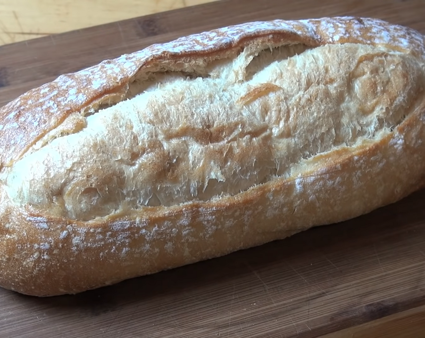 step 3 Take your Vienna Bread (1 loaf) and with a sharp bread knife make diagonal cuts into the bread about 3/4 of the way through at roughly 1-inch intervals.