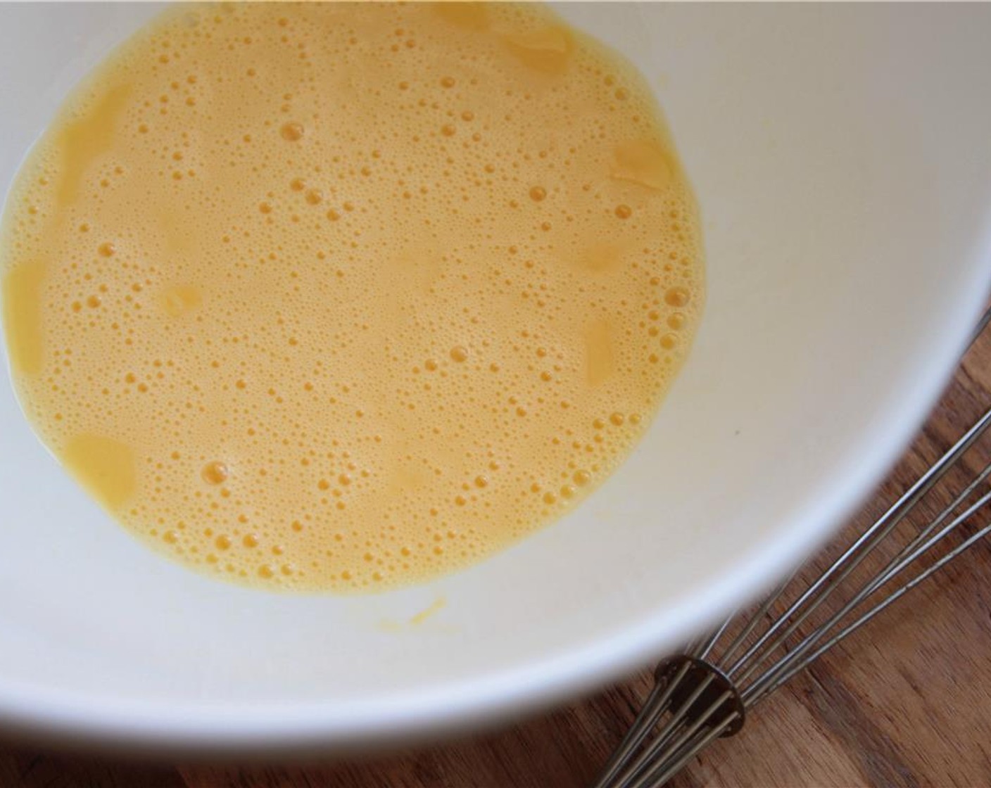 step 2 In a medium bowl, beat the Eggs (3) with a whisk until fluffy.