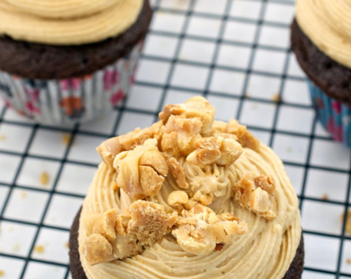 step 7 Top each cupcake with PayDay Candy Bars (2) crumbles. Serve immediately or refrigerate until ready to eat.