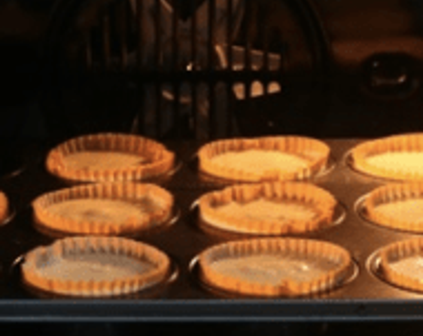 step 8 Bake in preheated oven for about 25-30 minutes. The cakes will puff up and shrink back a little during baking.