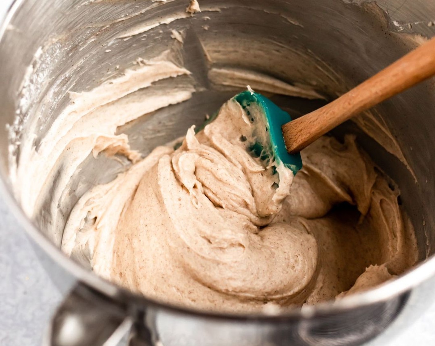 step 9 Turn the mixer down to a low speed and add in the Powdered Confectioners Sugar (3 cups) about 1 cup at a time. Mix until fully combined. Turn mixer back up to a higher speed and beat until fluffy, about 2 minutes.