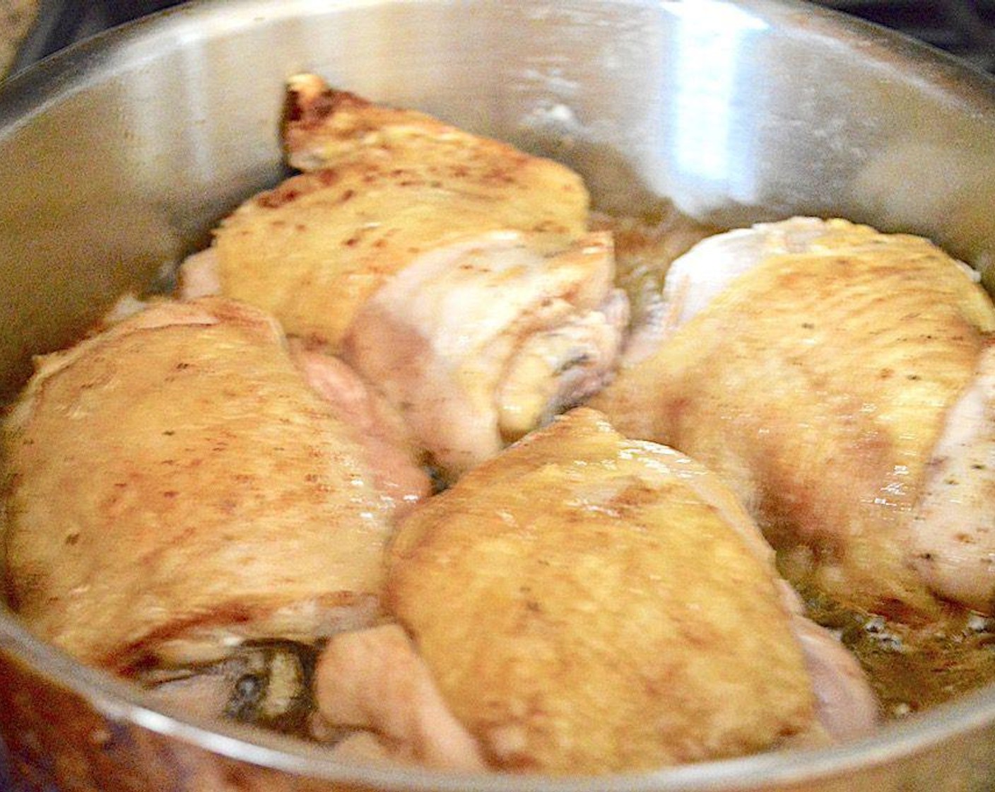 step 3 Get the pan back on the heat and add 4 of the chicken thighs with the skin side down so that the pan doesn't get overcrowded. Brown them for 5 minutes or so, until they release easily and cook them for another 5 minutes on the other side. Transfer them to a plate and repeat with the remaining 4 chicken thighs.