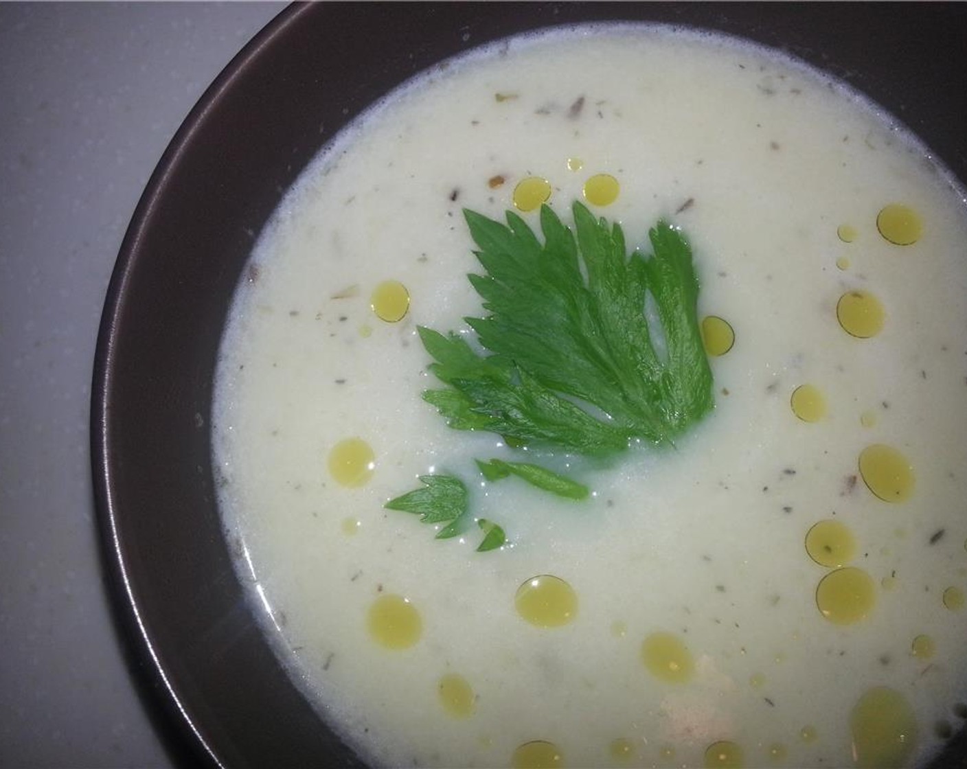 step 12 Ladle the soup into bowls and serve! Feel free to garnish with any nice greens or herbs you might have around. I used celery leaves and drizzled with a bit of olive oil. Enjoy!