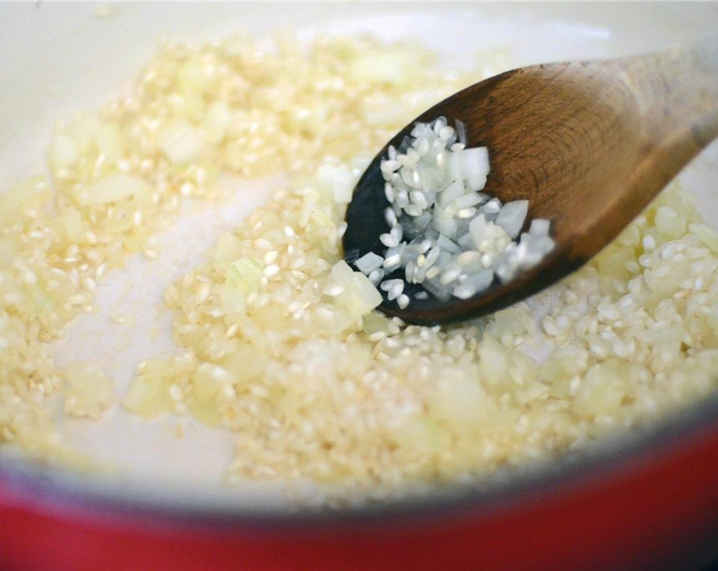 step 7 Add Arborio Rice (3/4 cup) and stir to coat with oil.