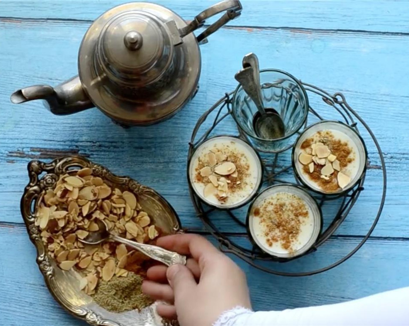 step 9 Garnish with Ground Cinnamon (to taste), Slivered Almonds (to taste) or as preferred.