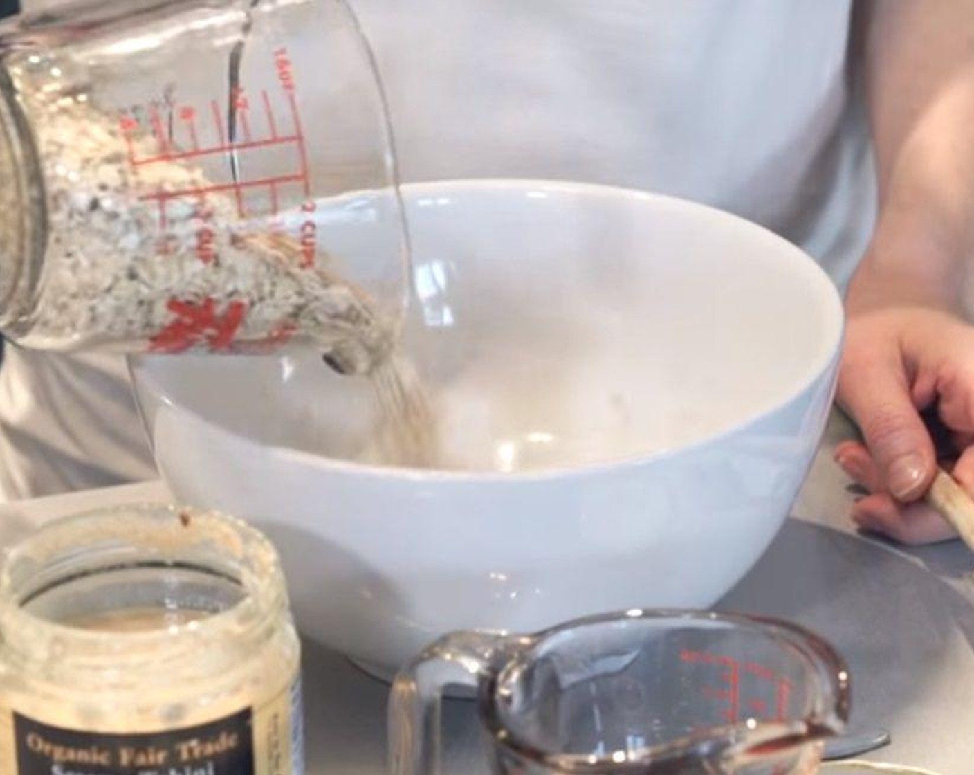 step 2 Combine Tahini (1/3 cup), Sea Salt (1/4 tsp), Maple Syrup (1/3 cup), Oats (1 1/2 cups), Simply Organic Cinnamon, Ground (1 Tbsp), Mini Chocolate Chips (1/3 cup) together in a large mixing bowl. Stir together until fully combined. Make sure the tahini is evenly spread throughout the cookies.