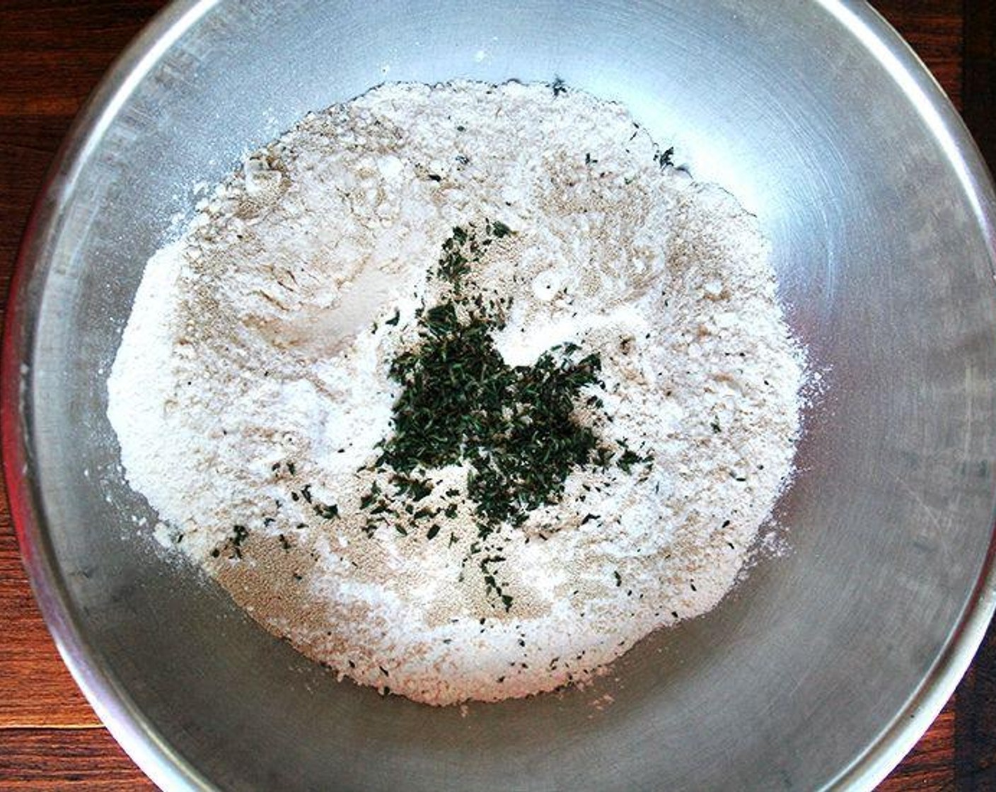 step 1 In a large mixing bowl, whisk together the All-Purpose Flour (4 cups), Kosher Salt (1/2 Tbsp), Granulated Sugar (1/2 Tbsp), Instant Dry Yeast (1/2 Tbsp), and Fresh Thyme Leaves (1 Tbsp).