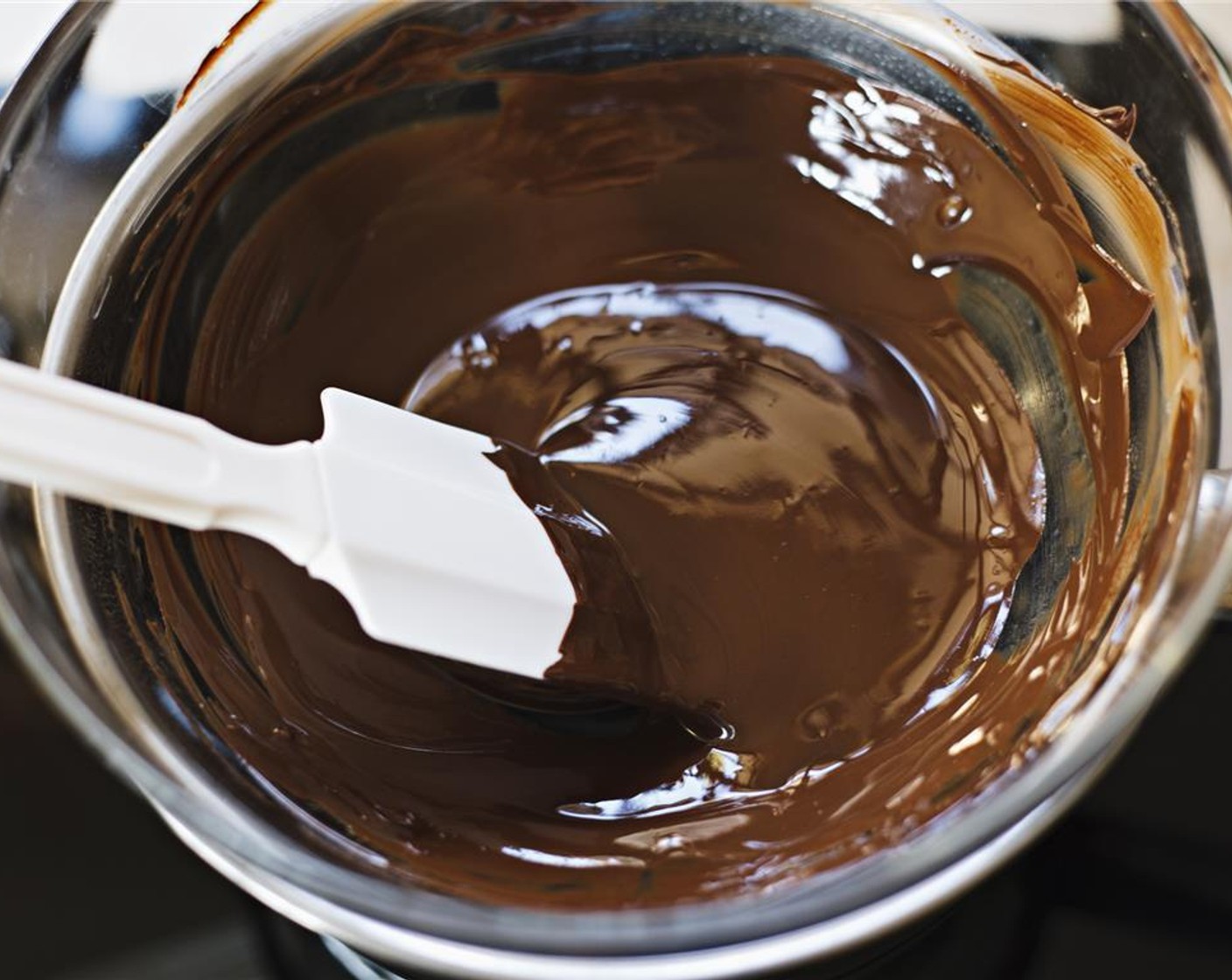 step 2 Melt Dark Chocolate (1 cup) in a double-boiler over a low heat until completely smooth.