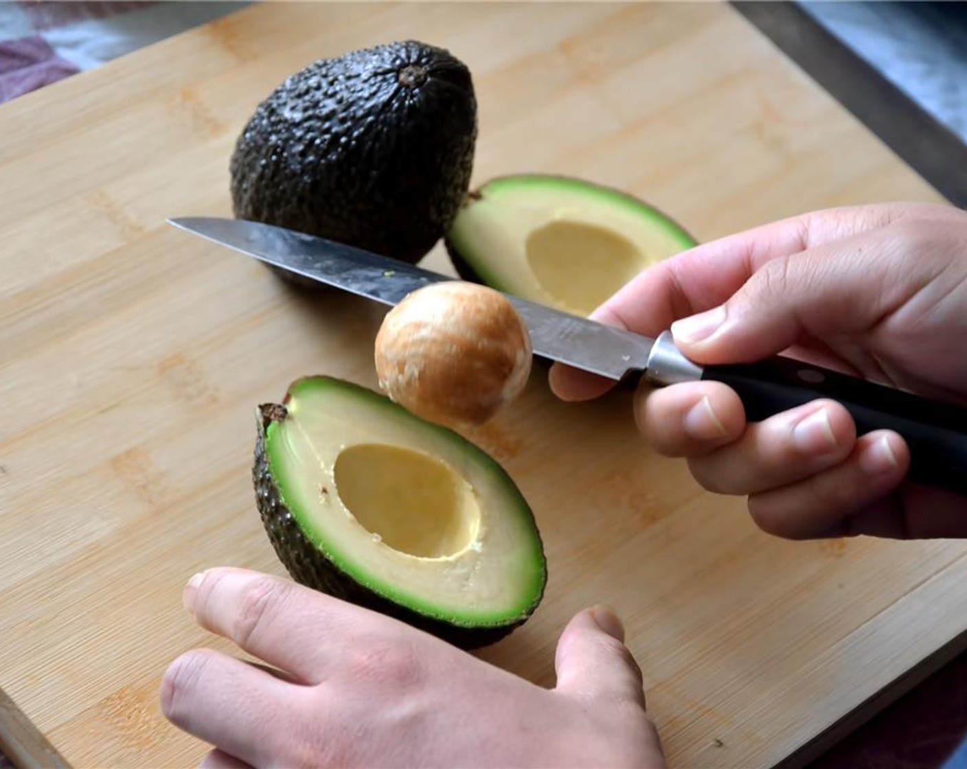 step 5 Slice the Avocados (5) in half, and remove the seeds.