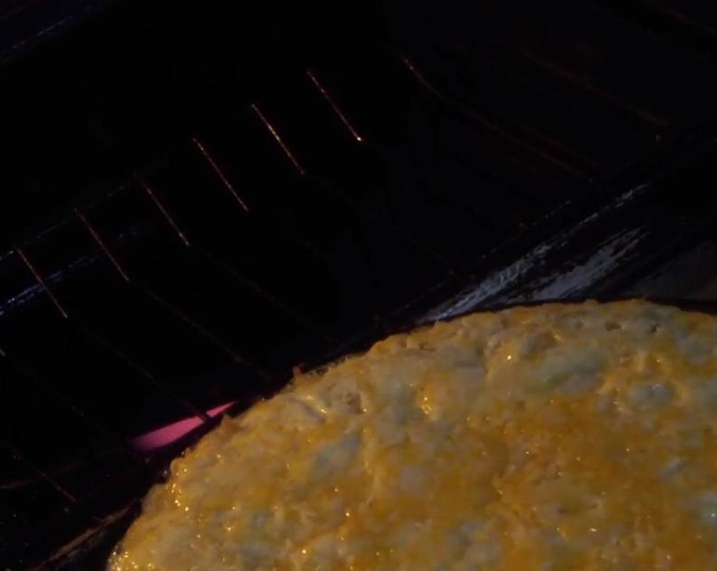 step 9 Place skillet on a sheet pan in case cheese bubbles over. Cover skillet with greased sheet of aluminum foil. Bake for 45 minutes.