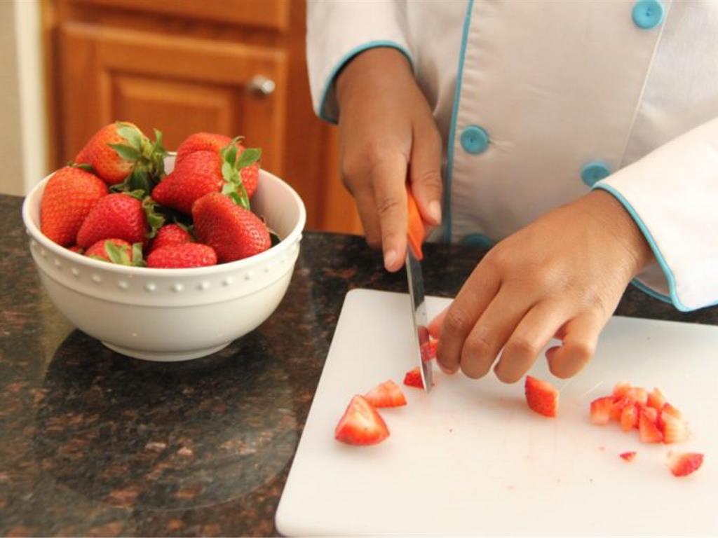 Step 1 of Three Layer Strawberry Pancakes Recipe: Dice the Fresh Strawberry (1 cup) into small pieces. Set aside.