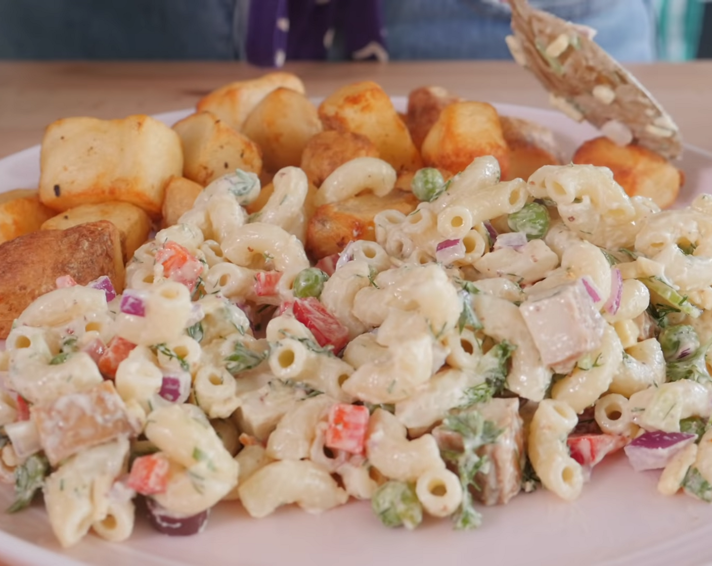 step 11 To assemble, lay out the home fries and macaroni salad on either half of the plate, covering the surface of the plate.