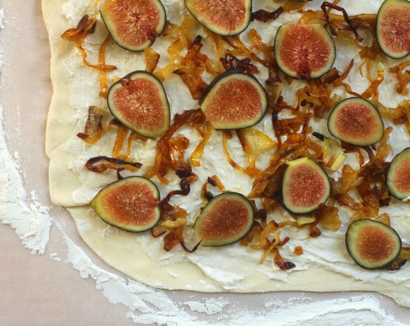 step 8 Quickly layer the sauce, onions, figs and Goat Cheese (3 2/3 Tbsp).