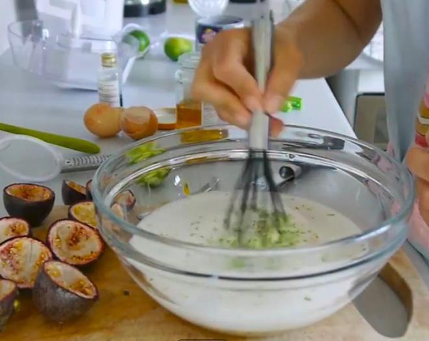 step 2 In a bowl add the Coconut Milk (2 cups), passion fruit pulp scooping it out with a teaspoon, Free Range Egg (2), Vanilla Extract (1 tsp), Honey (2 Tbsp), Limes (1 1/2), and mix everything well using a whisk.