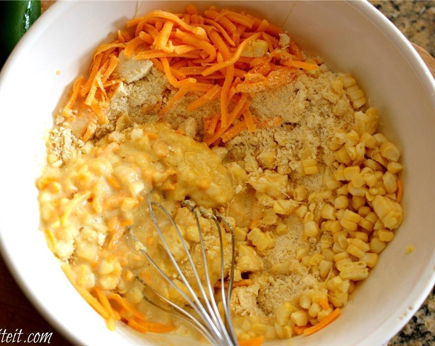 step 3 In a medium bowl, mix the Cornbread Mix (1 box) according to the box instructions, then add in Canned Corn (1 cup) and Shredded Cheddar Cheese (1 1/2 cups).