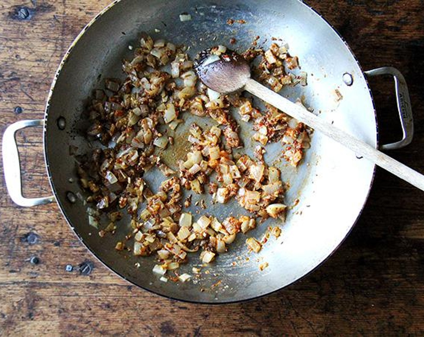 step 2 In a large oven-proof skillet over high heat, heat Olive Oil (2 Tbsp) until it shimmers. Add the Onion (1) and reduce the heat to medium. Add Kosher Salt (to taste) (I used about a pinch) and sauté until the onions are soft and translucent; about 5 minutes.