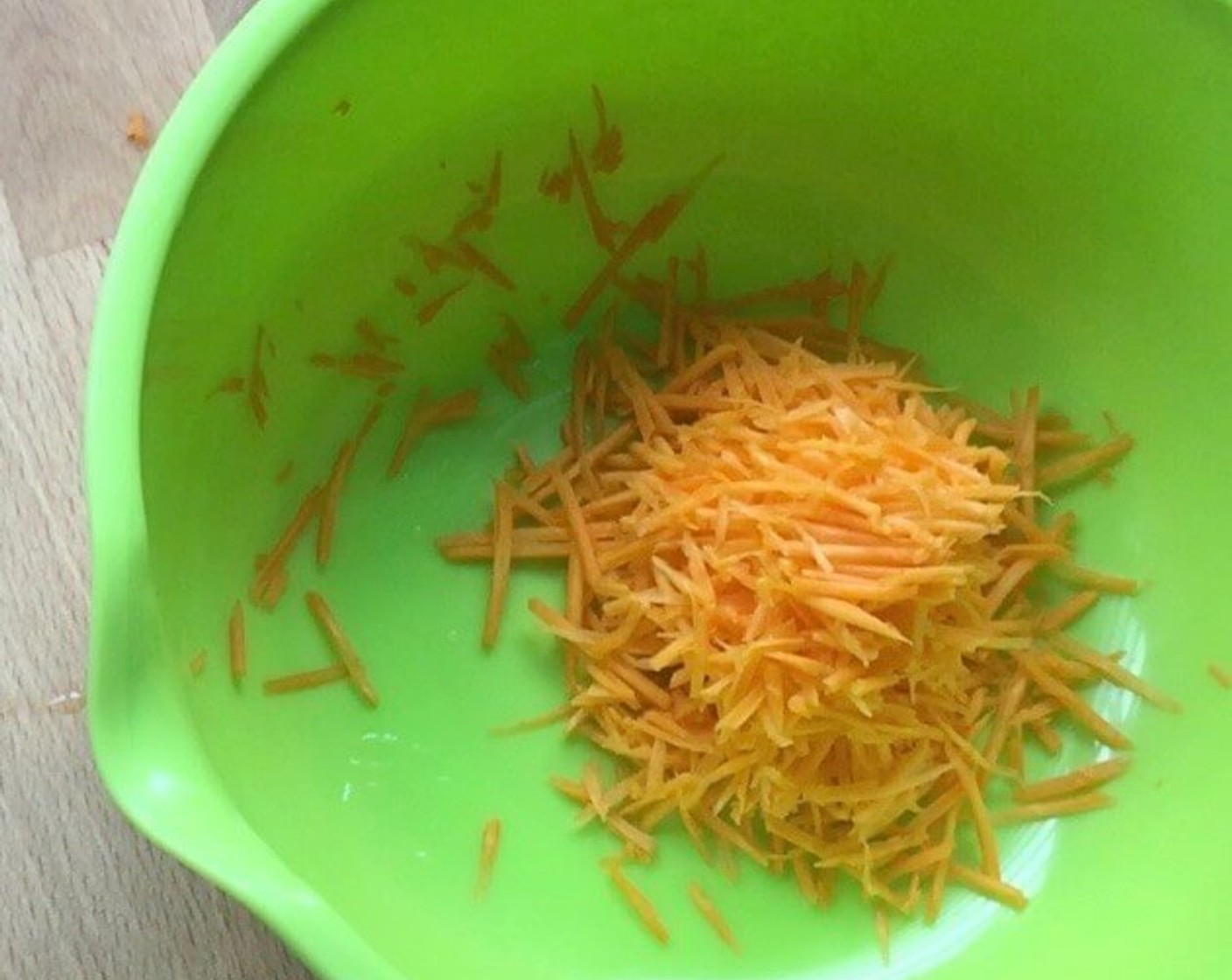 step 21 Shred Carrot (1/2) into thin strips.