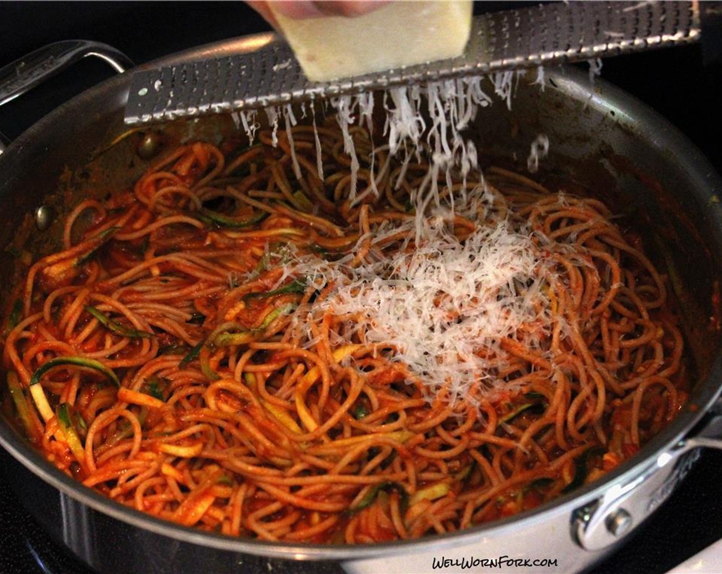 step 5 Add Olive Oil (1 Tbsp) to the hot saute pan along with grated zucchini and Salt (to taste) and Ground Black Pepper (to taste). Cook for a couple minutes before adding the Marinara Sauce (1 1/2 cups), Parmesan Cheese (1 cup) and cooked spaghetti.