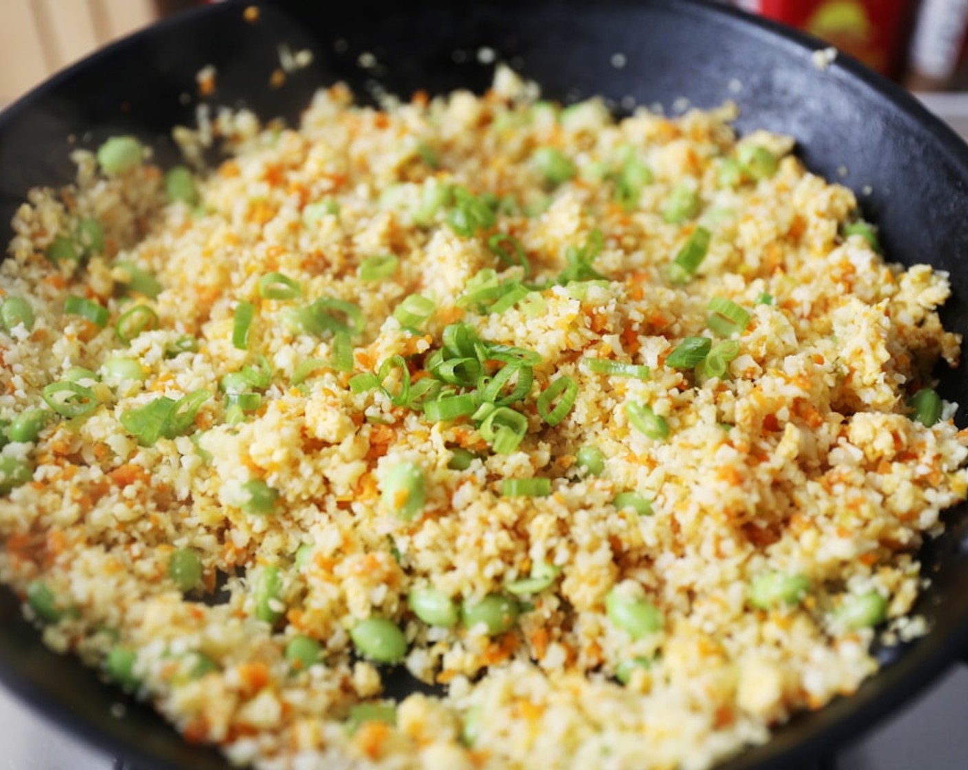 step 7 Place in a bowl and top with finely sliced scallion greens. Serve and enjoy!