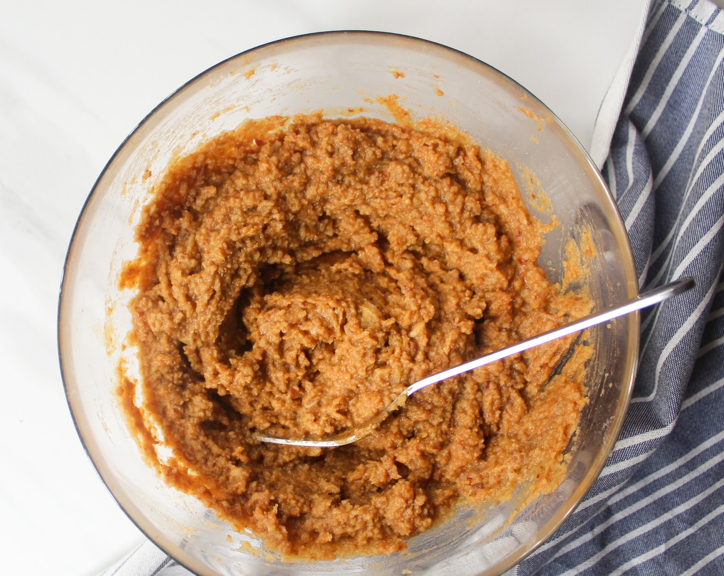 step 4 Transfer the paste in a mixing bowl and add in the Peanut Butter (1/2 cup) and Ground Cinnamon (1 tsp). Using a fork or spatula, combine until everything is well incorporated.