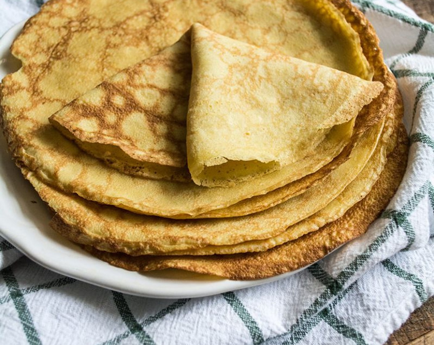 step 11 Once the crepe is stiff and can easily pull away from the pan, flip it and cook another 45 to 60 seconds. Remove and repeat.