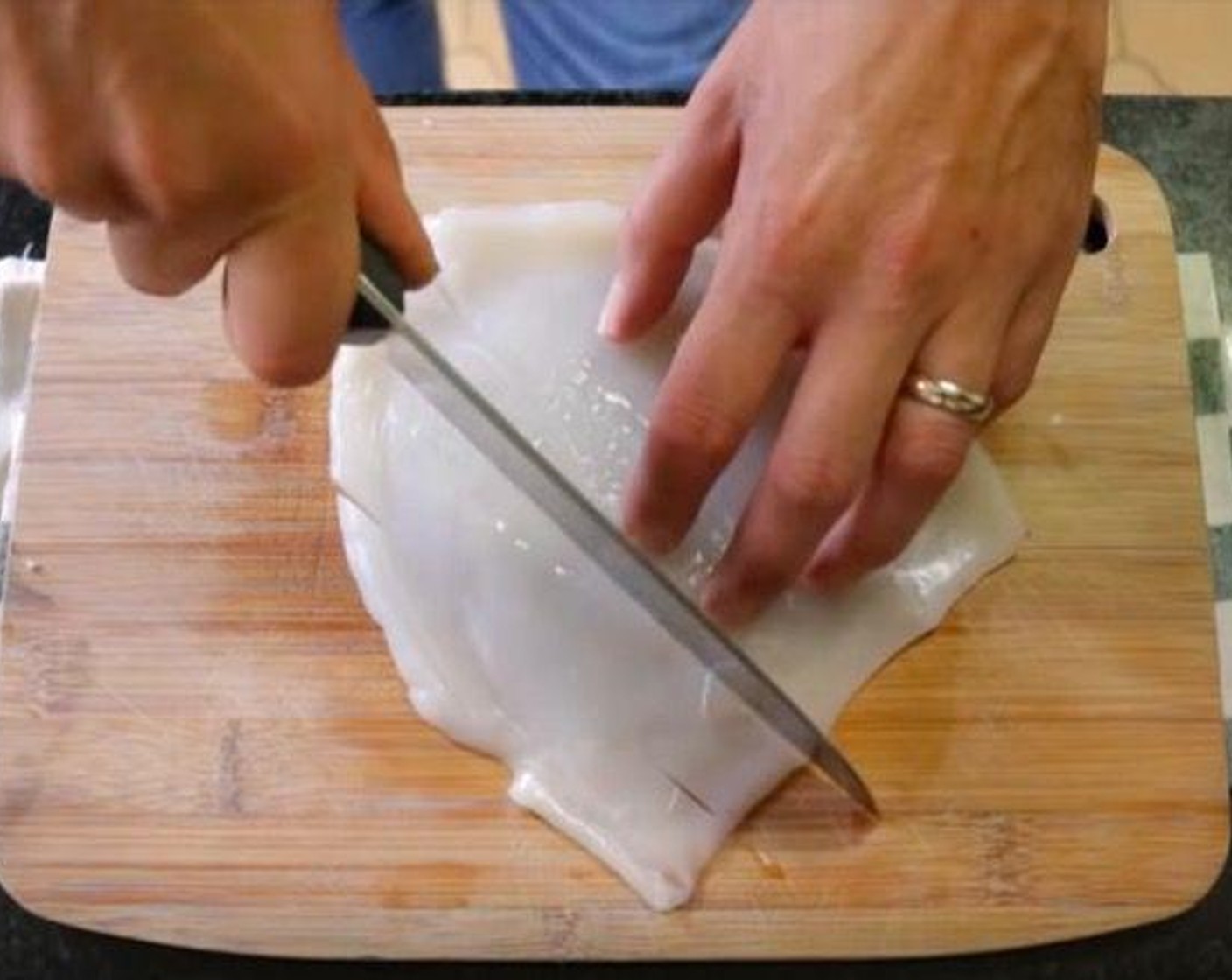 step 2 Cut Monkfish Tail (1) into two fillets by running your knife through the line of the bone, then cut each fillet into 1-inch pieces.