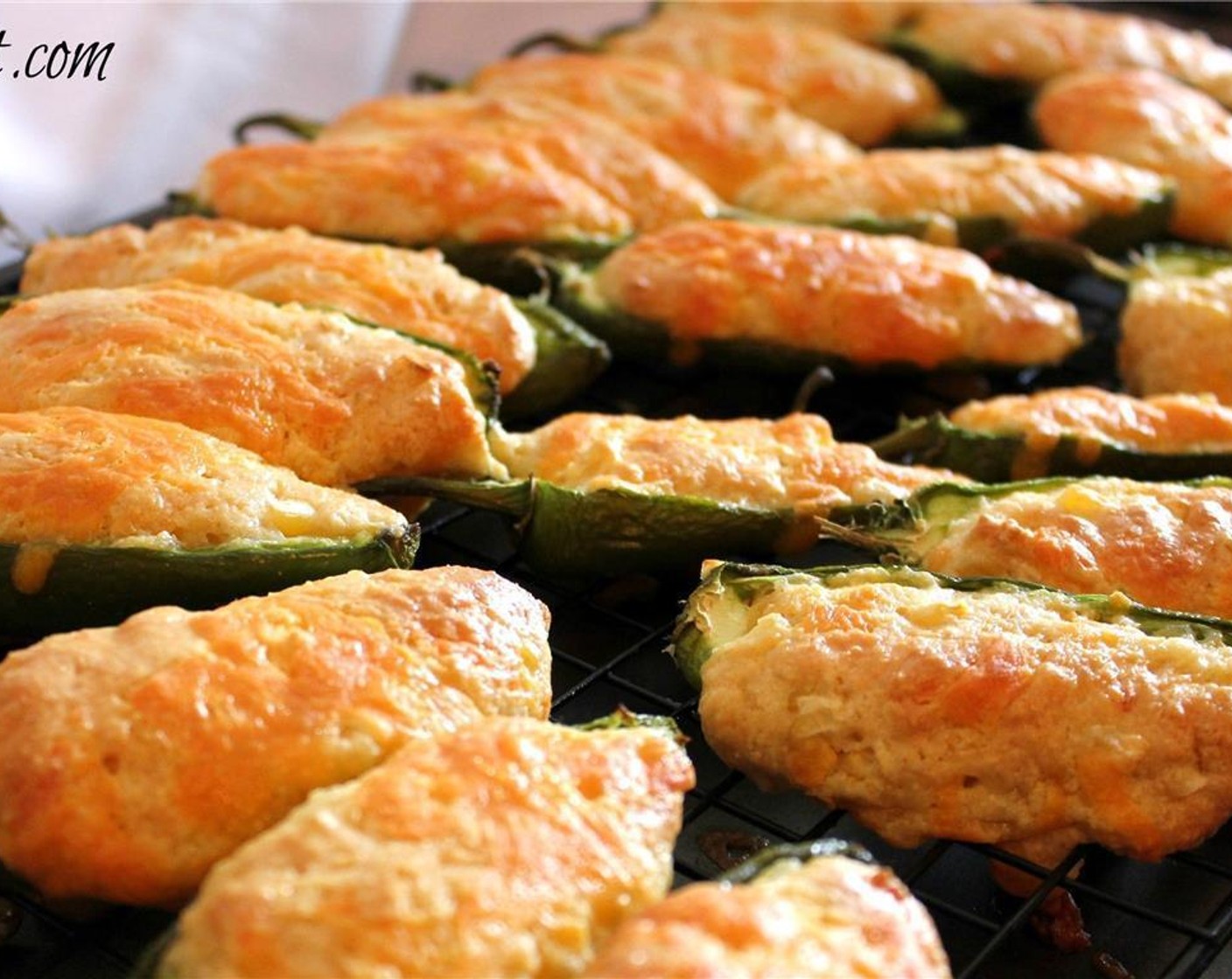 step 6 Place the peppers on a baking sheet and bake for 15-20 minutes, or until the cornbread is firm and cooked through. They will be puffed and cheesy!