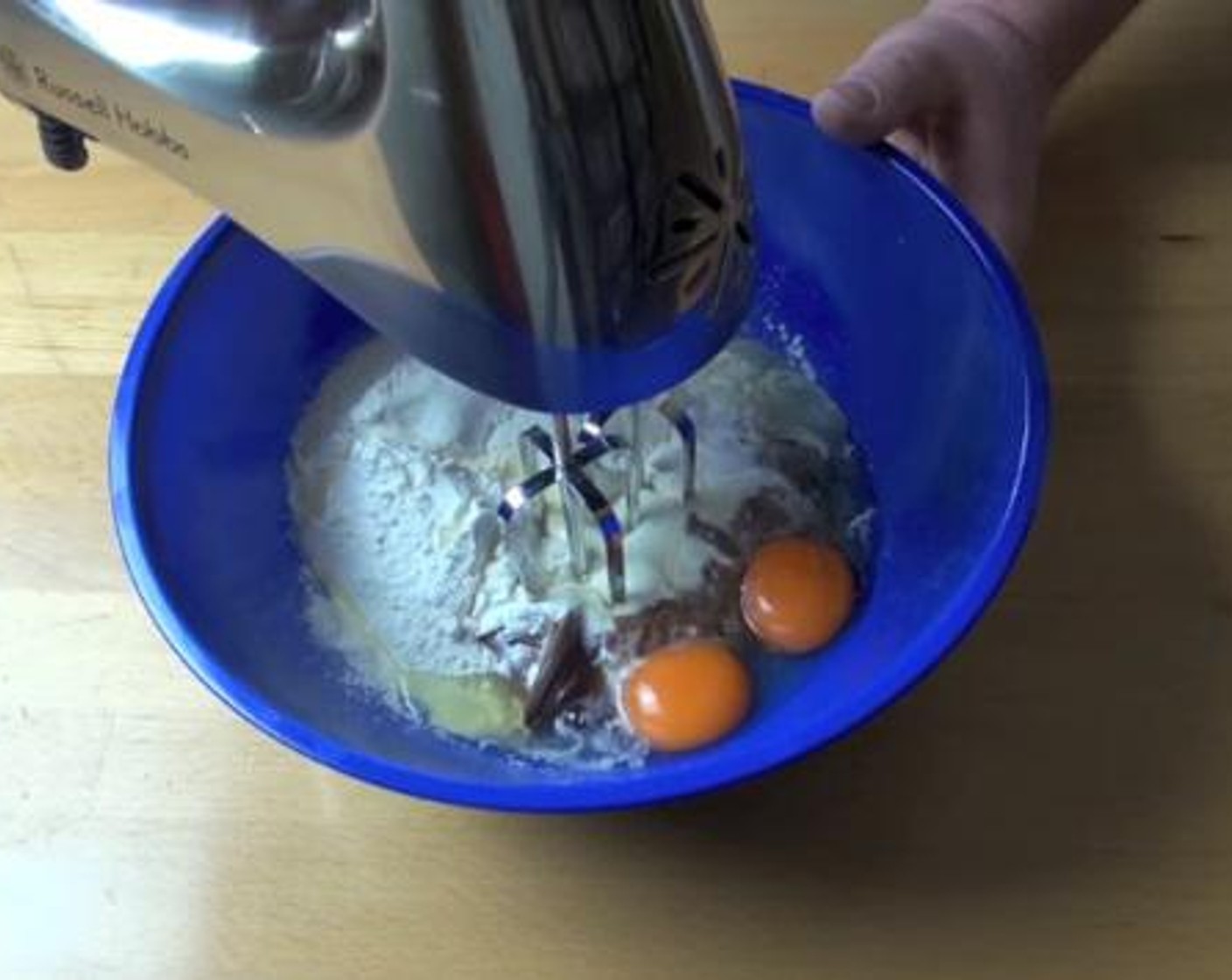 step 2 Into a mixing bowl, add the Nutella® (1 cup), Self-Rising Flour (2/3 cup), and Eggs (2).  Mix everything together using an electric mixer.