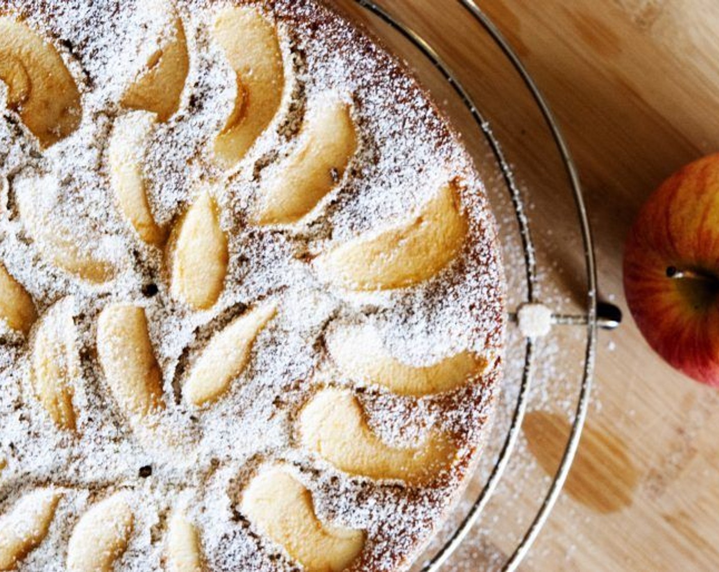 step 7 Remove cake from the oven and allow to cool. Dust with Powdered Confectioners Sugar (to taste).