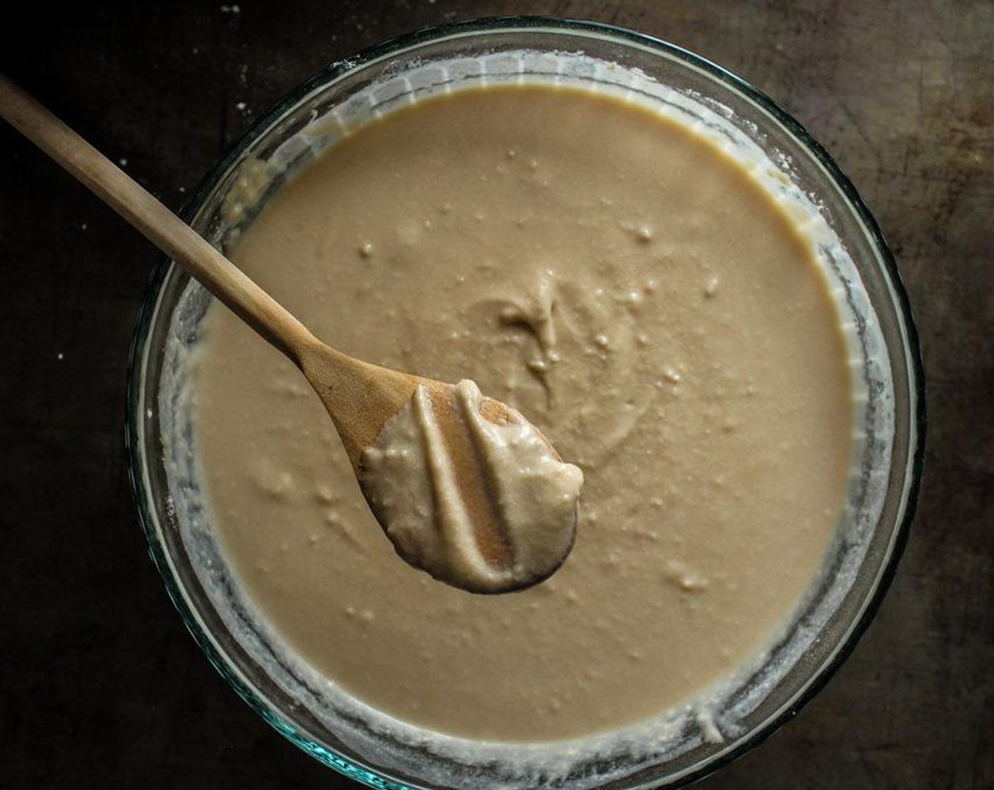 step 4 Slowly add in the Milk (1 cup) and mix until the batter is smooth. You want to achieve a pancake batter consistency. Run your finger through the batter on a back of a spoon and if it keeps it’s shape and it’s not too runny or thick, then you’re good.