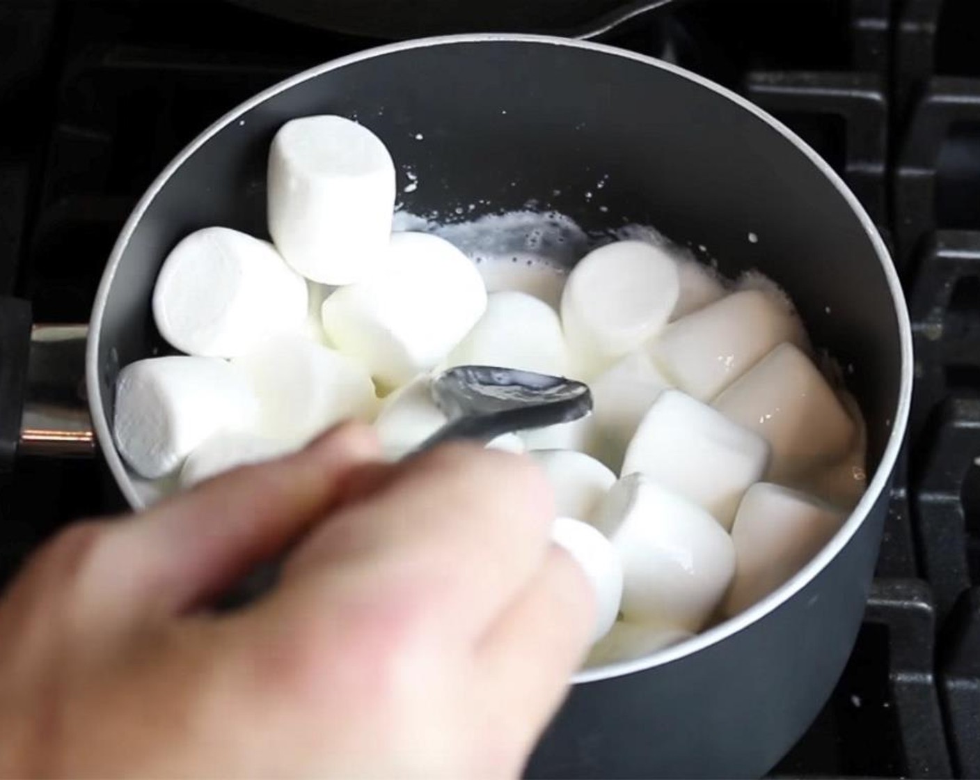 step 6 Pour Milk (1 cup) into a pan and melt Marshmallows (10.5 oz) over medium heat.