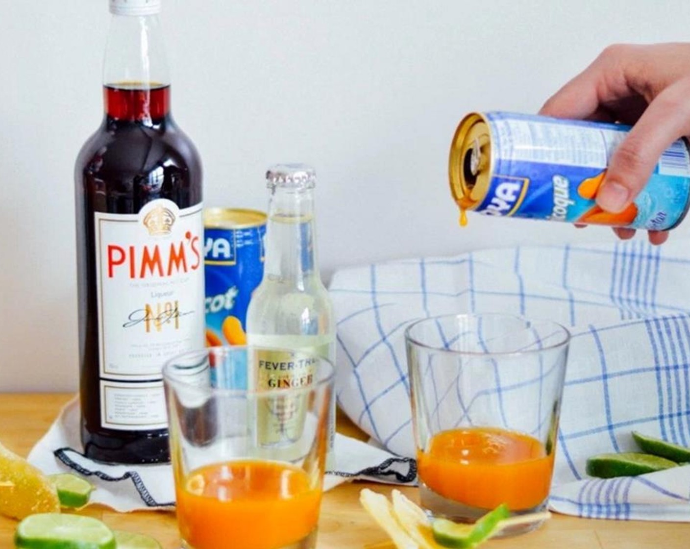 step 1 Pour about a quarter of the Apricot Nectar (165 mL) into each of your glasses.