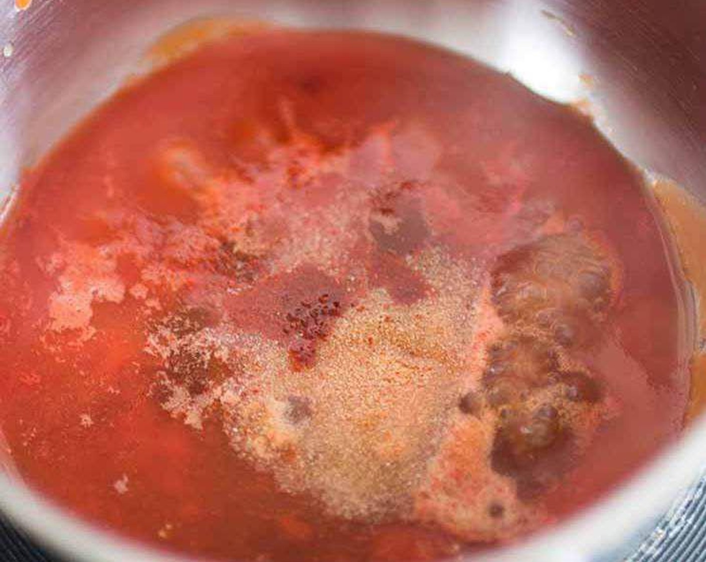 step 2 Reduce to low heat, pour over the Tomato Passata (3/4 cup) and add the Light Soy Sauce (2 Tbsp), Maple Syrup (2 Tbsp), Apple Cider Vinegar (2 tsp),  Smoked Paprika (1 tsp), Simply Organic Onion Powder (1 tsp), Yellow Mustard (1/2 tsp), and Salt (1/4 tsp). Cook for 5 minutes, stirring regularly to allow the flavors to blend.