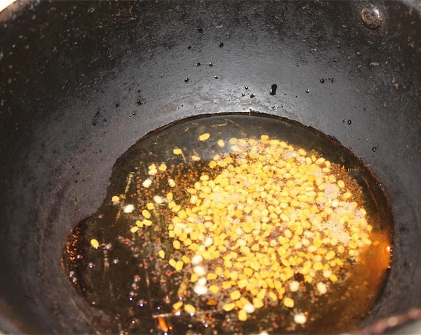 step 3 Add Fenugreek Seeds (1 tsp) and cook until the mixture browns.