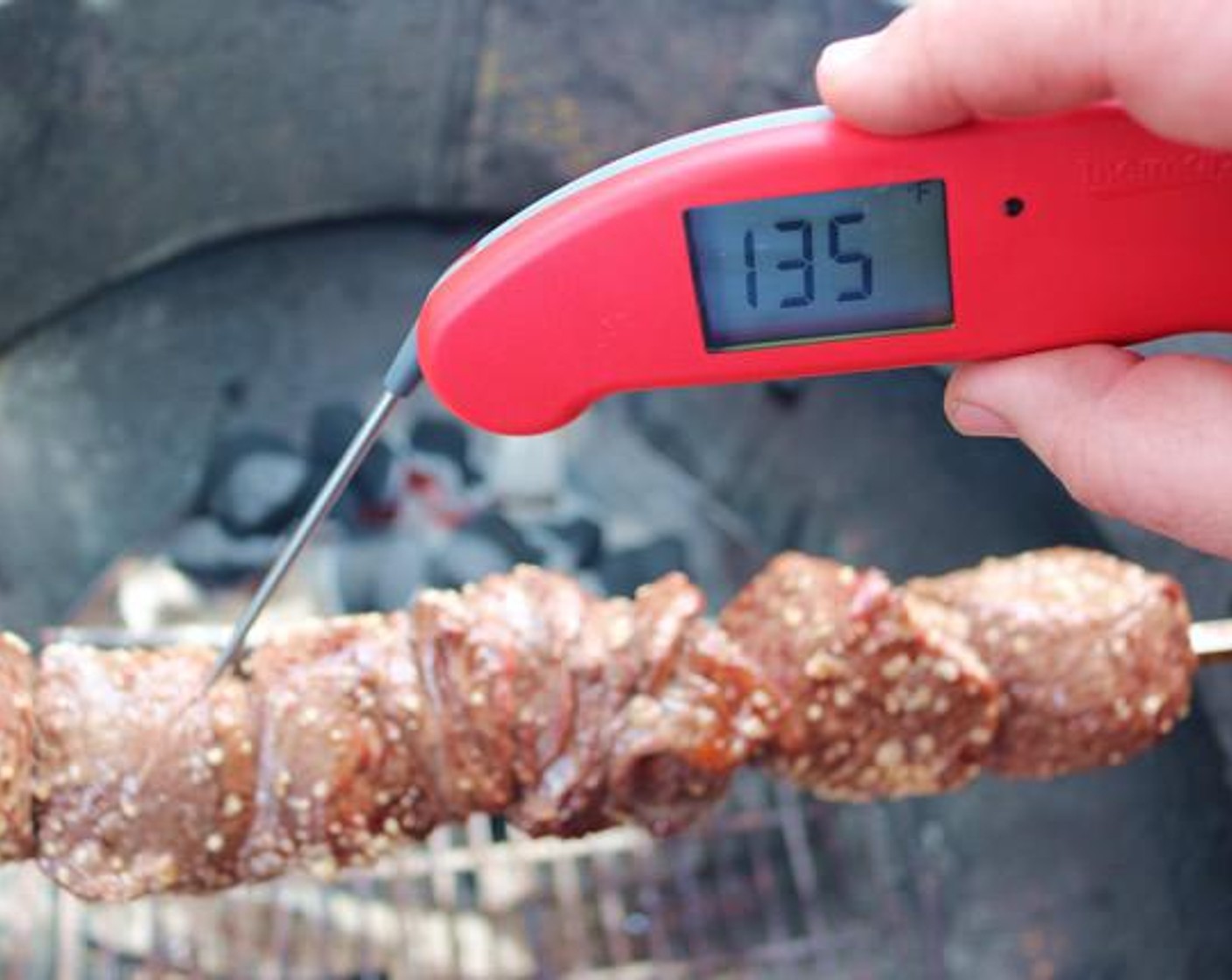 step 6 Cook over hot coals for approximately 20-25 minutes or until internal temperature reaches 130-135 degrees F (54-57 degrees C), or your preferred doneness.