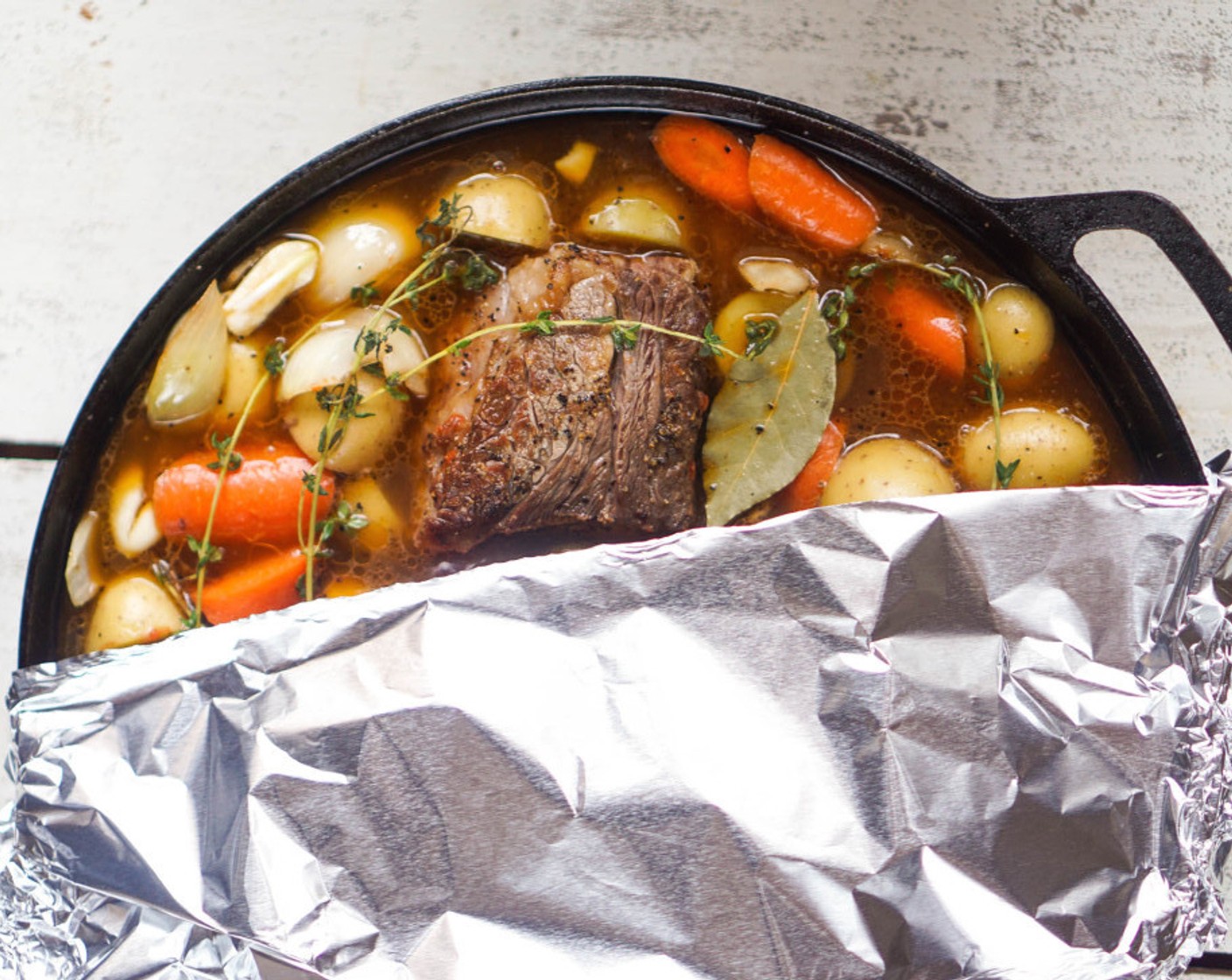 step 6 Add Beef Stock (3 cups) until the vegetables and short ribs are just about, but not fully, submerged. Add the Fresh Thyme (3 sprigs) and Bay Leaves (2). Bring to a boil and boil for 2 minutes.