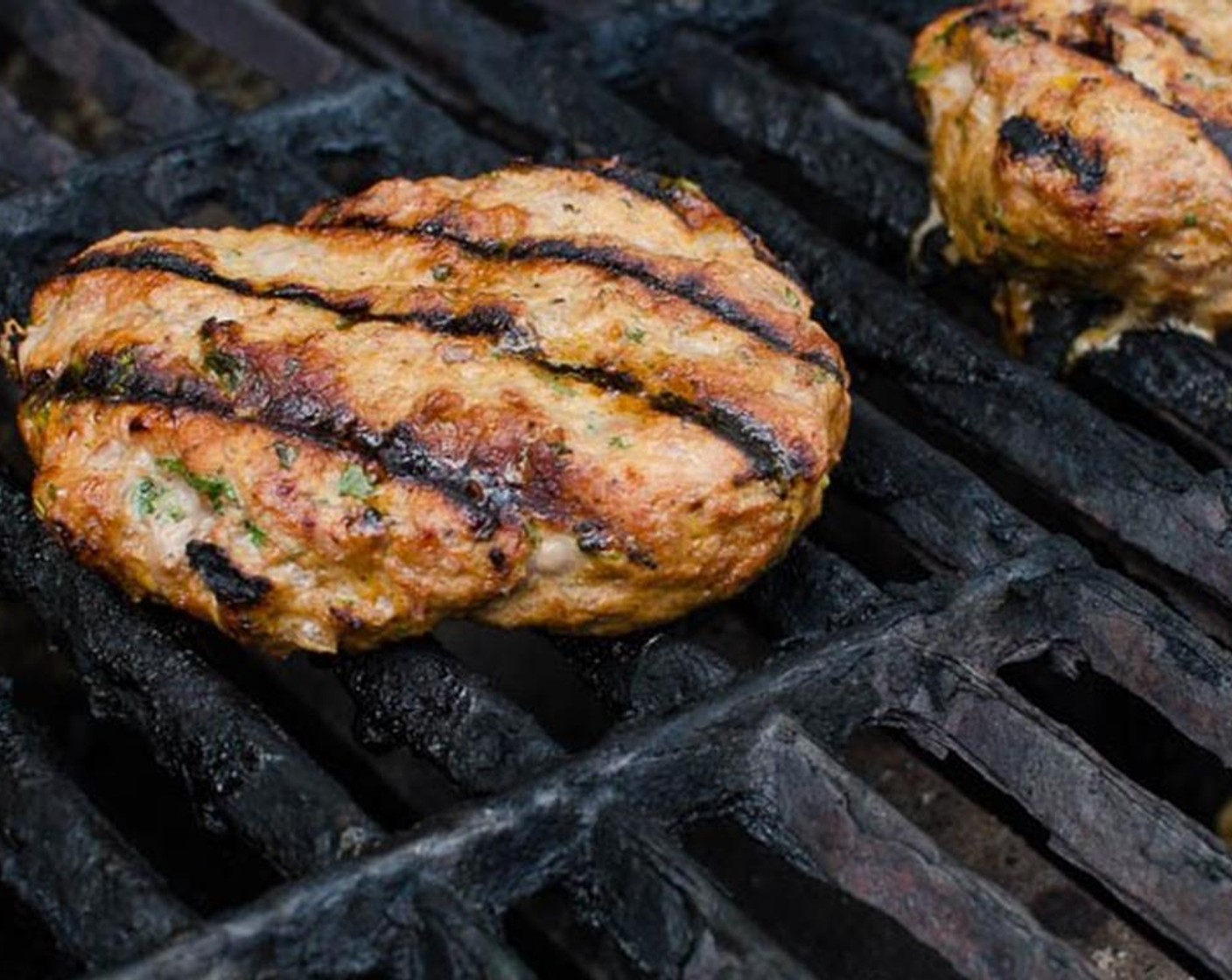 step 6 When grill is hot add the burgers and cook about 5 minutes per side or until they reach 165 degrees F internal temperature. During the last minute of cooking, place an American Cheese Slices (5) on each burger and cook until it’s just melted.