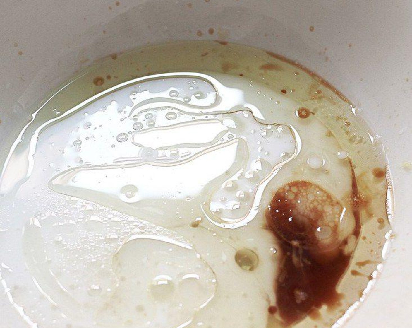 step 2 Mix the Vegetable Oil (1/3 cup), Coconut Milk (1 cup), Vanilla Extract (1/2 Tbsp), and juice from Lemon (1) in a large mixing bowl.