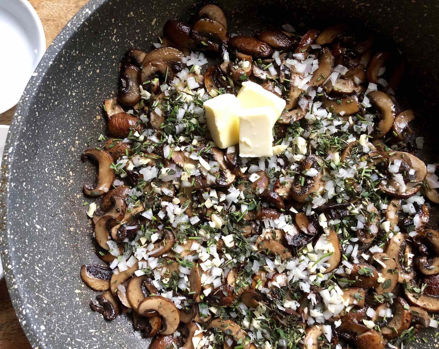 step 5 Add in the Shallots (2 Tbsp), Garlic (1/2 Tbsp), Fresh Thyme Leaves (1/2 Tbsp), Rosemary Leaves (1 tsp), and Unsalted Butter (1 1/2 Tbsp).