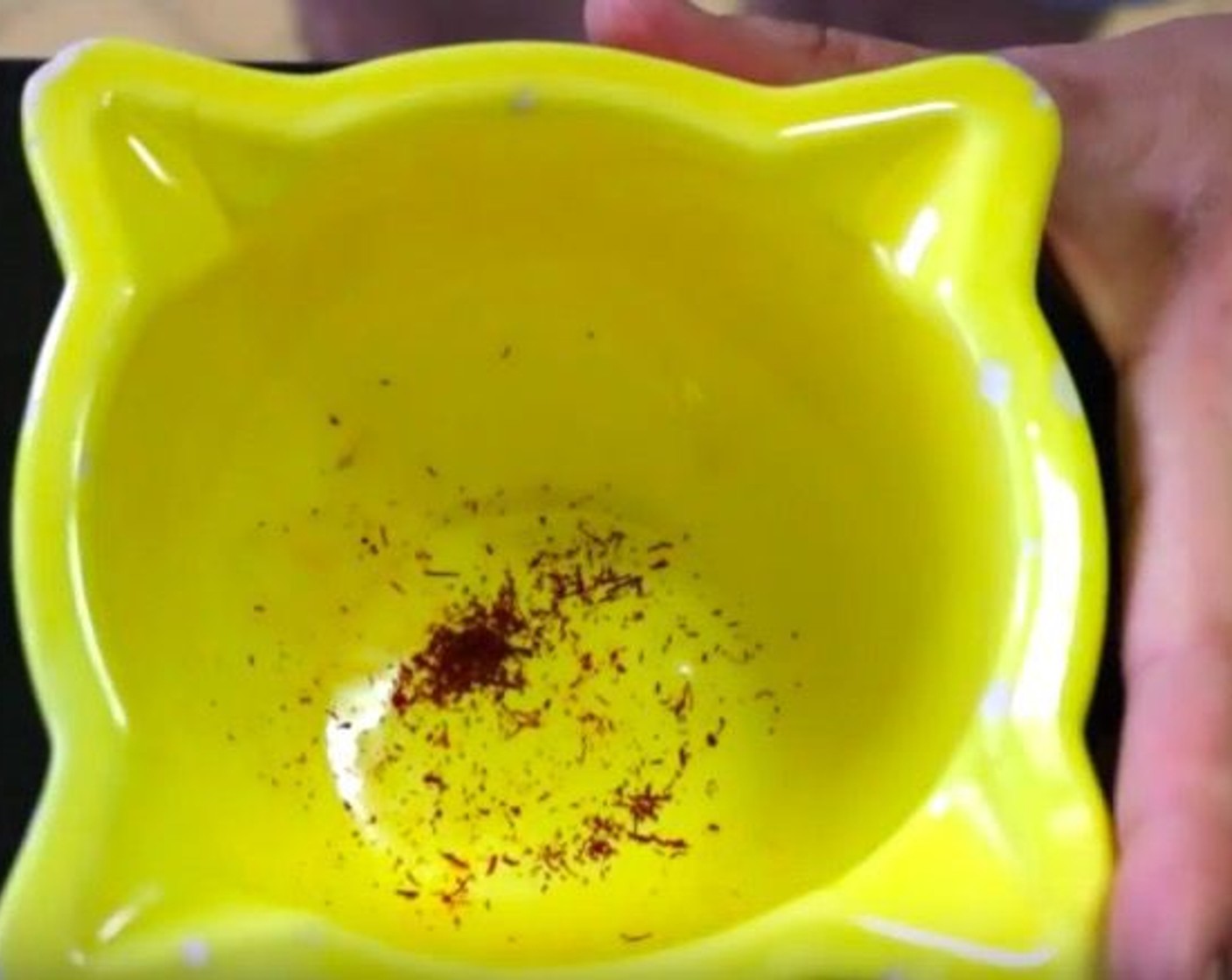 step 8 To make the saffron dijon sauce, add Saffron Threads (1/2 tsp) into a mortar. Using a pestle, pound down on the saffron until you form a powder.