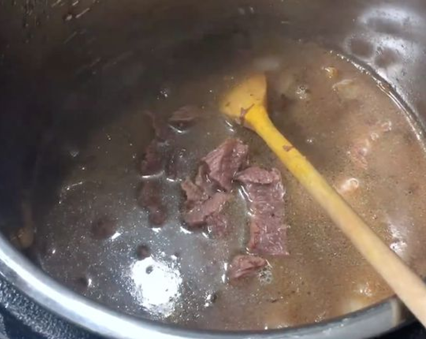 step 5 Add the All-Purpose Flour (3 Tbsp) and stir. Pour in the beef rib and broth. Add Brown Sugar (2 tsp), Dried Thyme (1 tsp), Balsamic Vinegar (1 Tbsp), Salt (to taste), and Ground Black Pepper (to taste). Cover with lid and cook in a pressure cooker for 5 minutes using the soup function.
