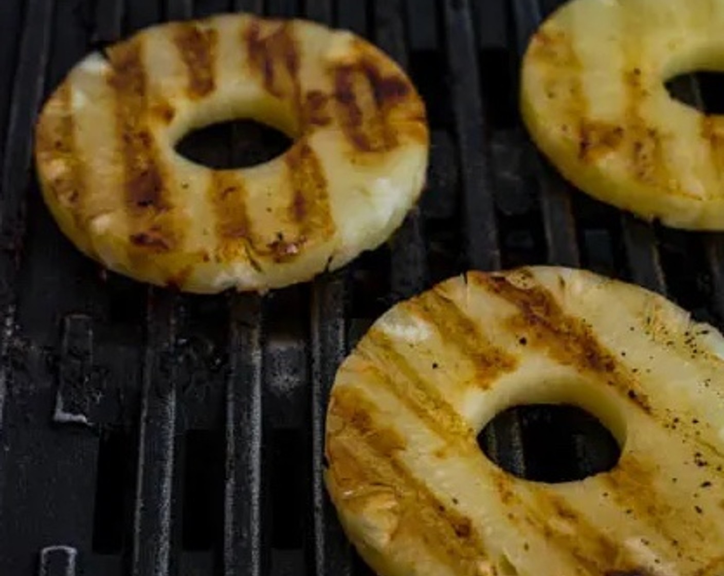 step 5 Set the Pineapple Ring (1) on the grill or skillet. Grill for 1 minute per side.