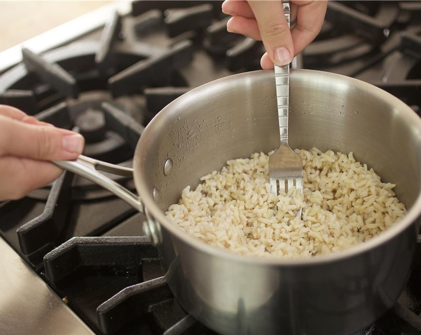 step 3 Cover and cook for 25 minutes, or until the rice is tender and all moisture has been absorbed. Fluff rice and keep covered until plating.