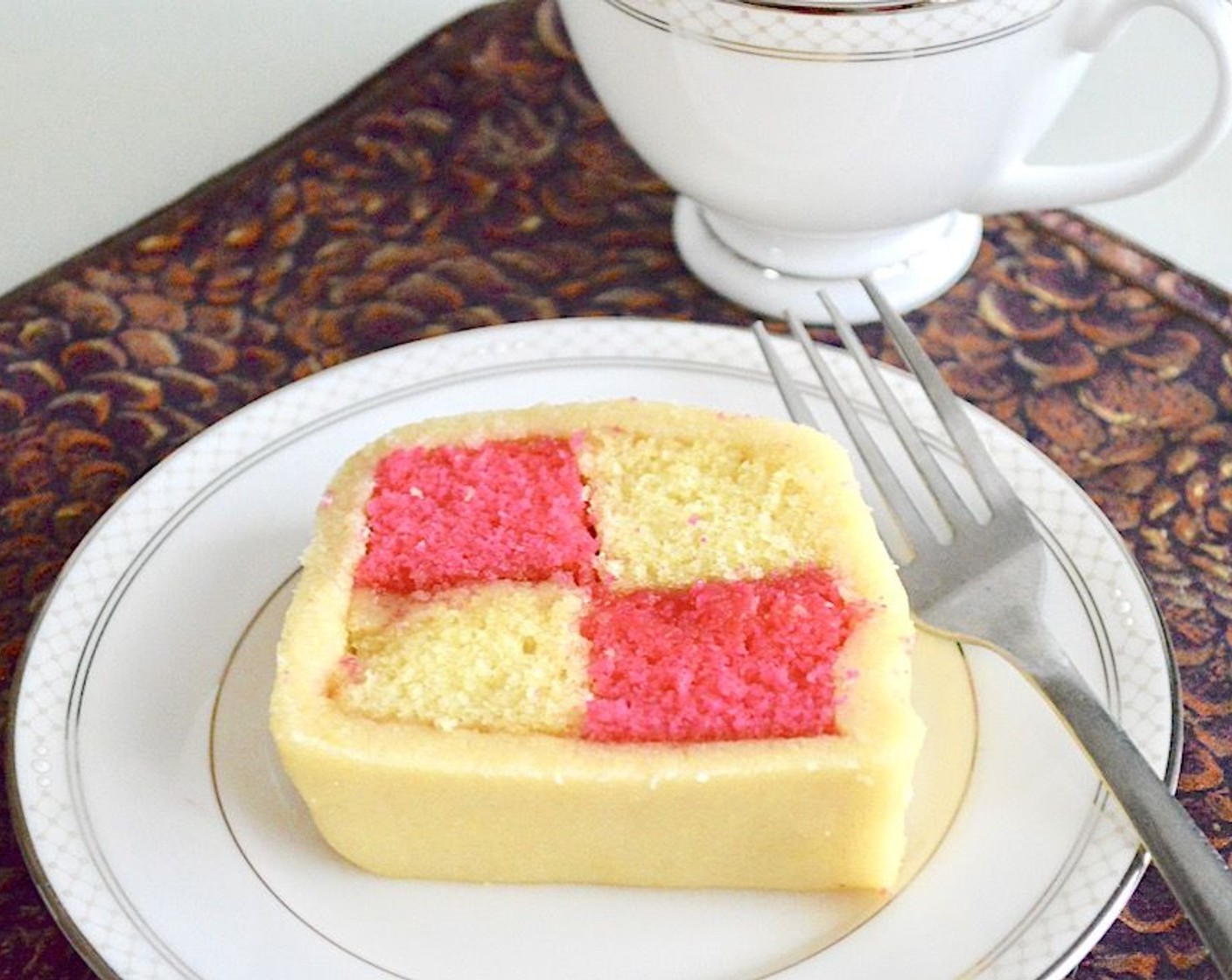 step 12 Use a fork to gently score criss cross marks on the top for some visual interest. Serve with tea! It will also keep for days covered in the refrigerator since the marzipan keeps the cake from drying out. Serve and enjoy!