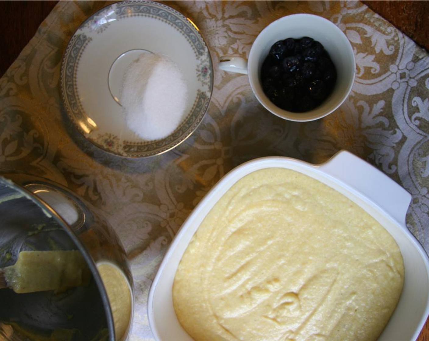 step 4 Add flour in 3 batches alternating with Milk (2/3 cup) in 2 batches. Spread into prepared pan.