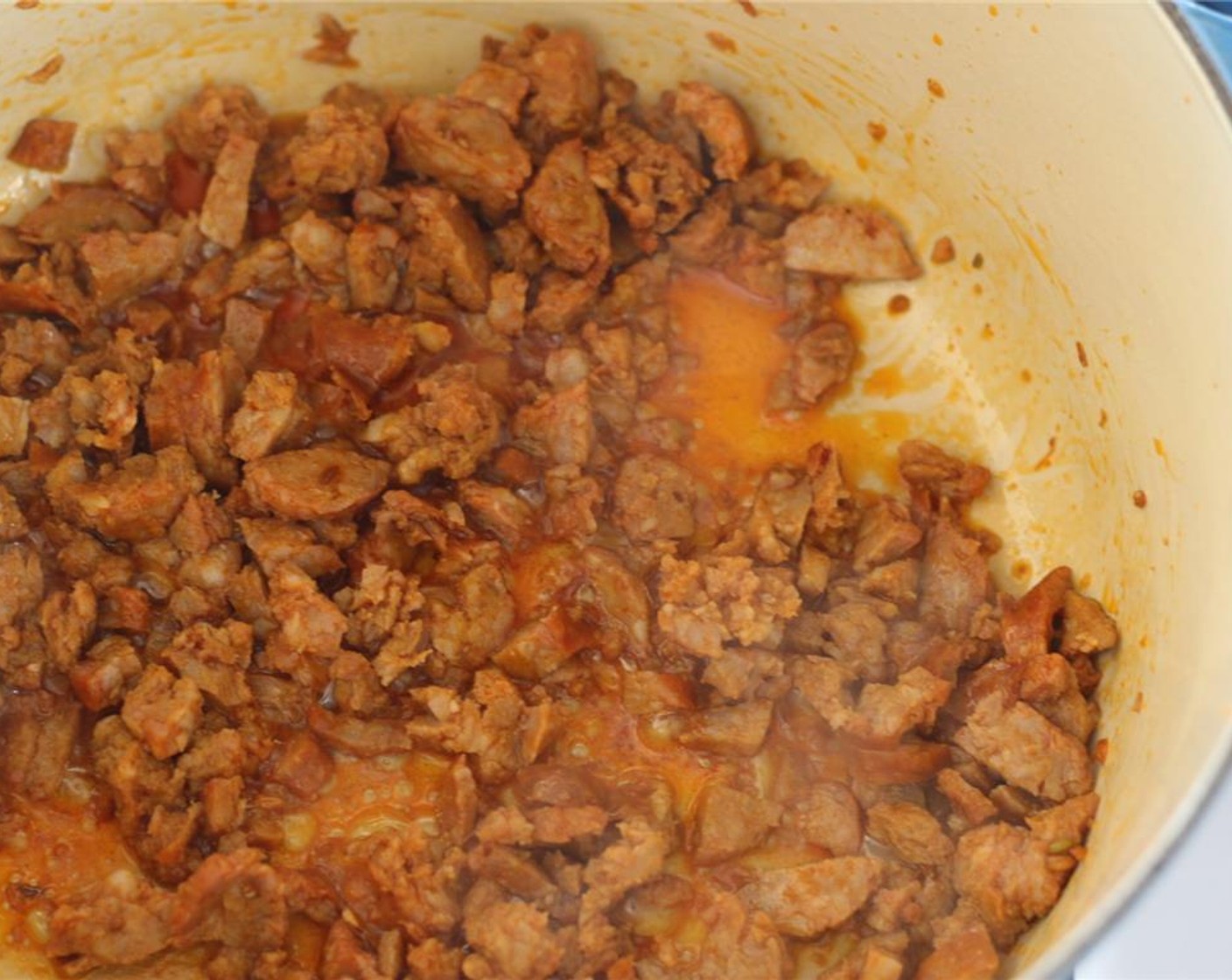 step 3 Sear the Italian Sausage Links (8 oz) in a large stock pot over medium-high heat.