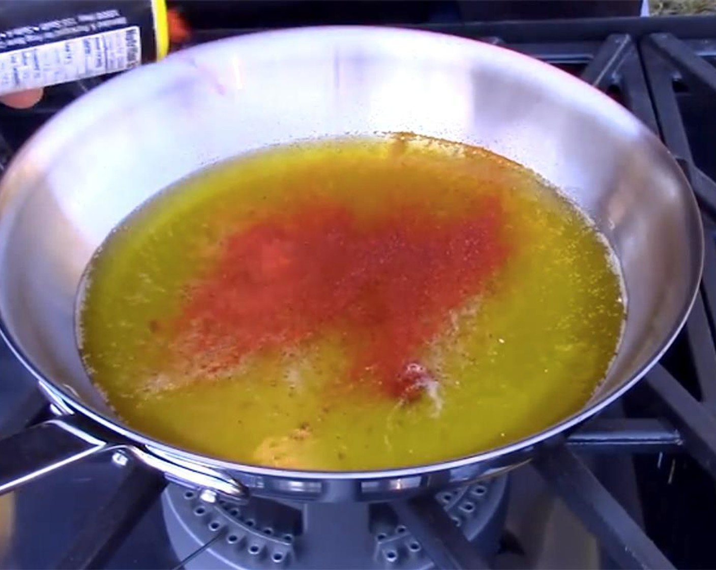 step 4 Pour the clarified butter back into the saucepan, simmer over low heat and mix in Cajun Seasoning (1 Tbsp).