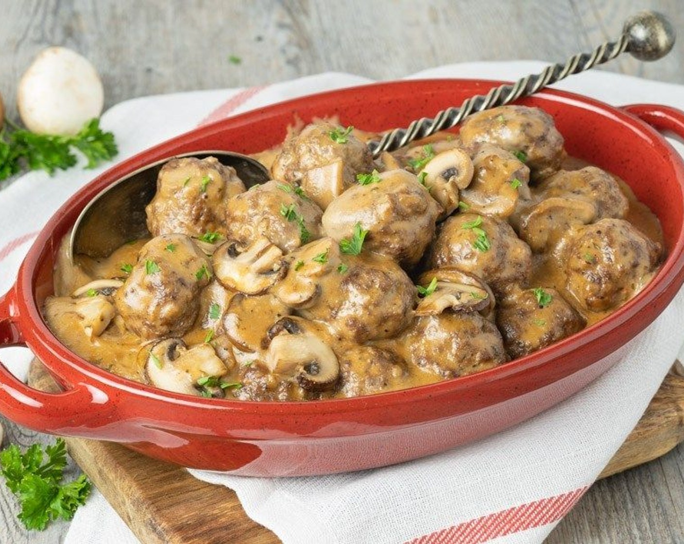 step 9 Add meatballs to the sauce and stir gently to coat with sauce. Cover and bake for 30-35 minutes. Remove from oven and serve immediately over noodles, rice or potatoes.